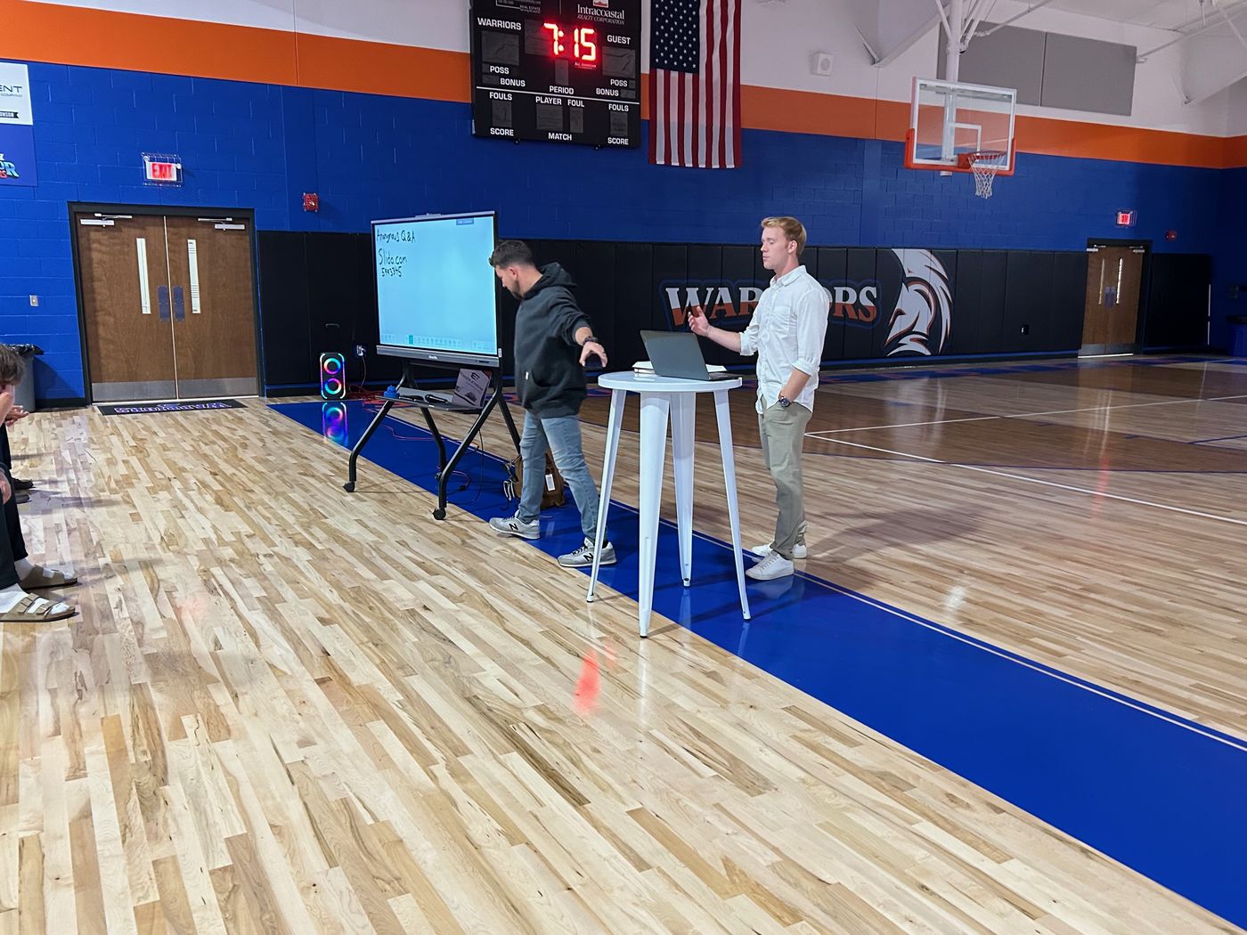 Hayden and a co-leader presenting to students